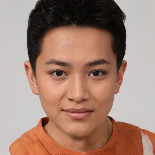 Joyful asian young-adult female with short  black hair and brown eyes
