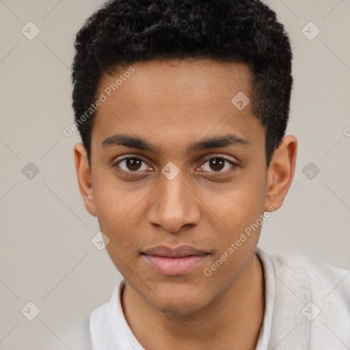 Joyful latino young-adult male with short  brown hair and brown eyes