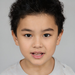 Joyful white child female with short  brown hair and brown eyes