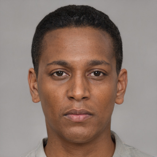 Neutral black young-adult male with short  black hair and brown eyes