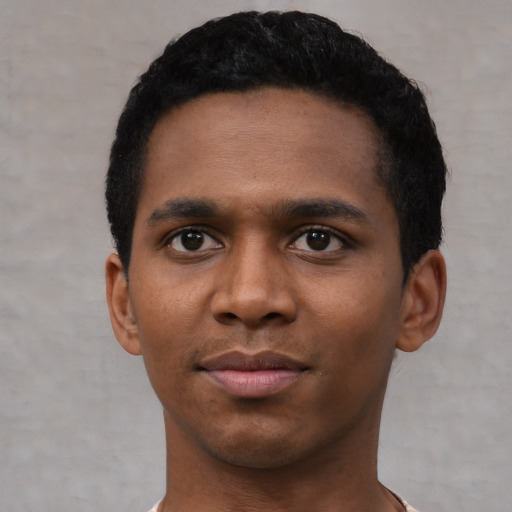Neutral black young-adult male with short  black hair and brown eyes