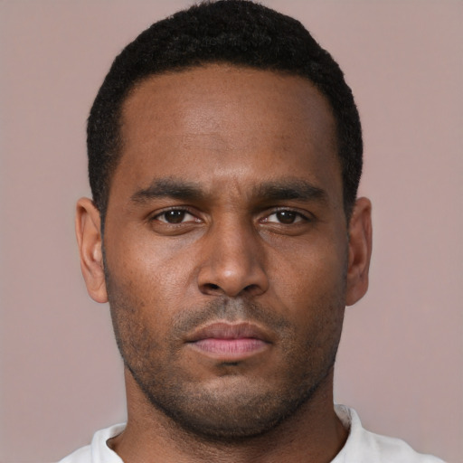 Neutral black young-adult male with short  brown hair and brown eyes