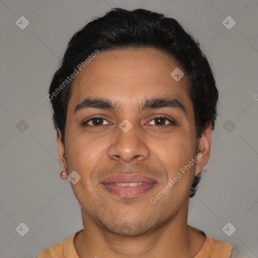 Joyful latino young-adult male with short  black hair and brown eyes