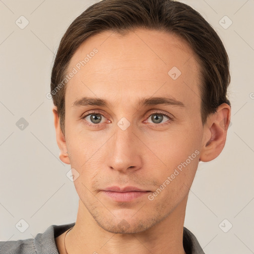 Neutral white young-adult male with short  brown hair and grey eyes