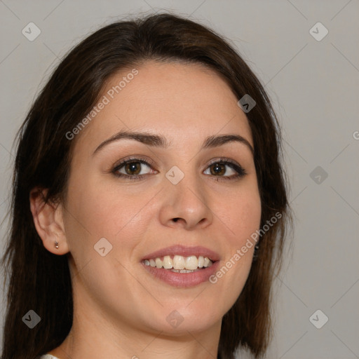 Joyful white young-adult female with long  brown hair and brown eyes