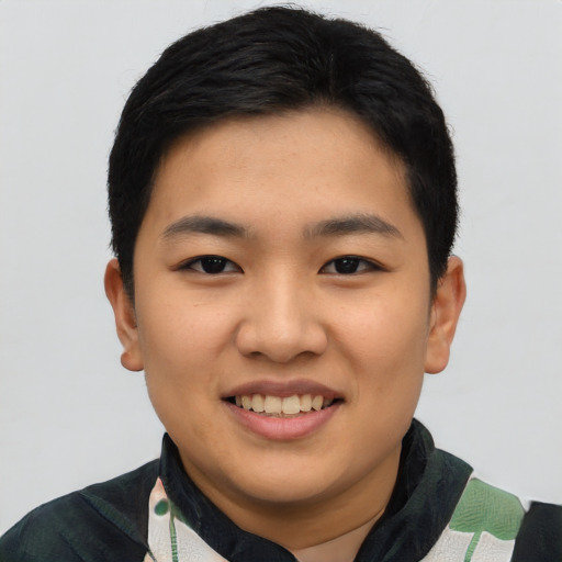 Joyful asian young-adult male with short  black hair and brown eyes