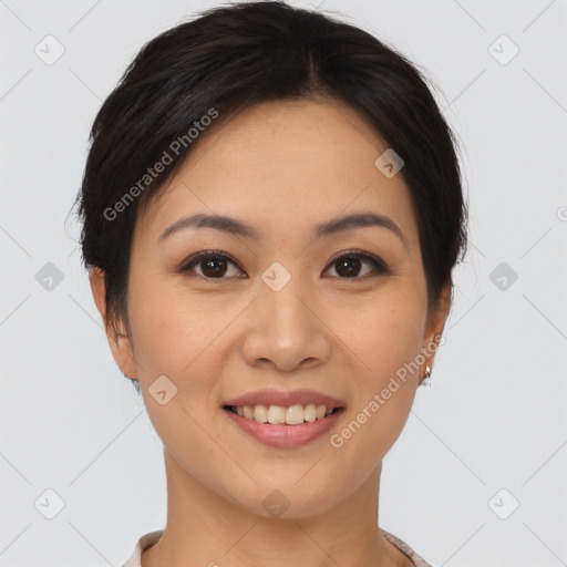 Joyful asian young-adult female with short  brown hair and brown eyes