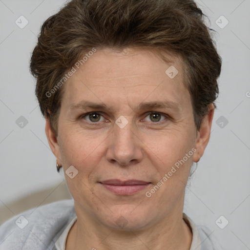 Joyful white adult female with short  brown hair and brown eyes