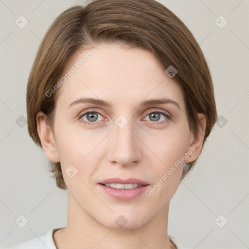 Joyful white young-adult female with short  brown hair and grey eyes