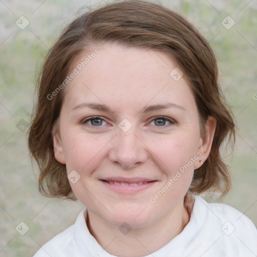 Joyful white young-adult female with medium  brown hair and blue eyes