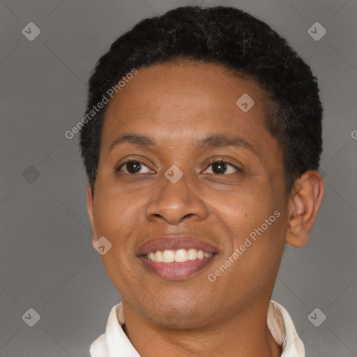 Joyful black adult female with short  brown hair and brown eyes