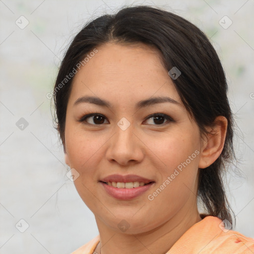 Joyful latino young-adult female with medium  brown hair and brown eyes