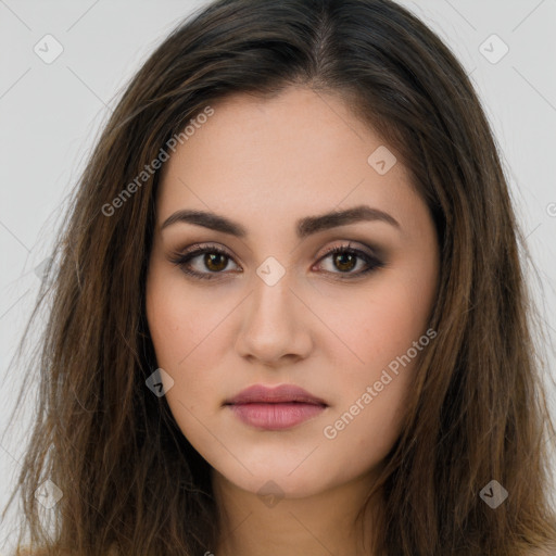 Neutral white young-adult female with long  brown hair and brown eyes