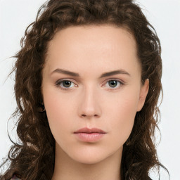 Neutral white young-adult female with long  brown hair and green eyes