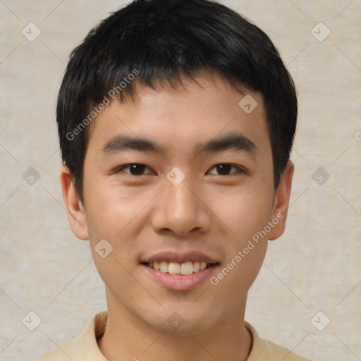 Joyful asian young-adult male with short  brown hair and brown eyes