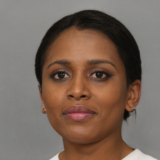 Neutral black young-adult female with short  brown hair and brown eyes