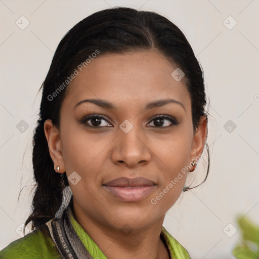 Joyful black young-adult female with medium  brown hair and brown eyes