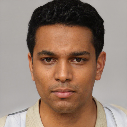Neutral latino young-adult male with short  black hair and brown eyes