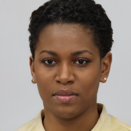 Neutral black young-adult female with short  brown hair and brown eyes