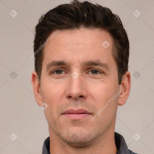 Neutral white adult male with short  brown hair and brown eyes