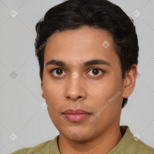 Neutral latino young-adult male with short  black hair and brown eyes