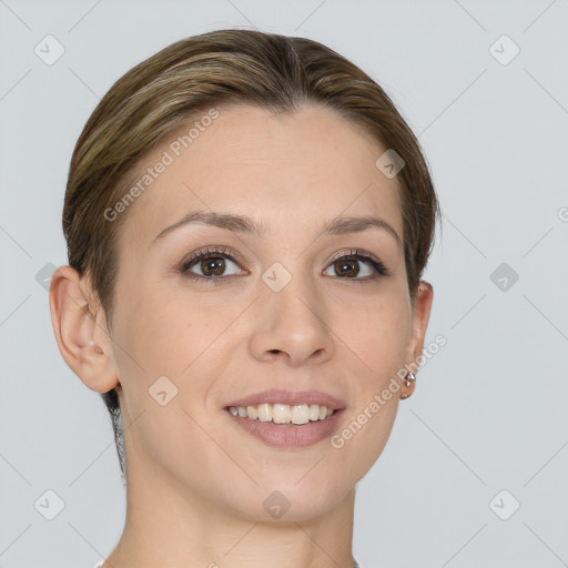 Joyful white young-adult female with medium  brown hair and grey eyes