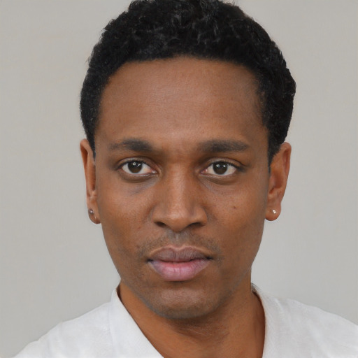 Neutral black young-adult male with short  black hair and brown eyes