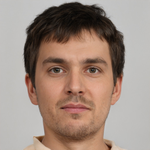 Neutral white young-adult male with short  brown hair and brown eyes