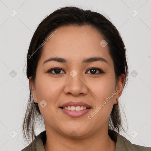 Joyful latino young-adult female with medium  brown hair and brown eyes