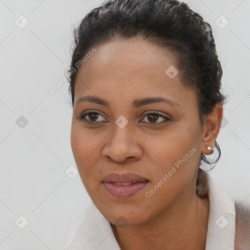 Joyful latino young-adult female with short  brown hair and brown eyes