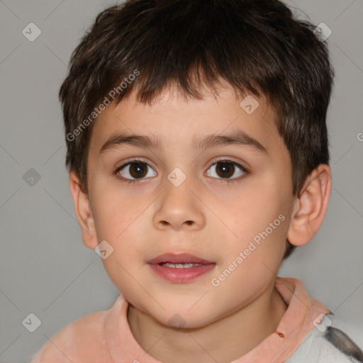 Joyful white child male with short  brown hair and brown eyes