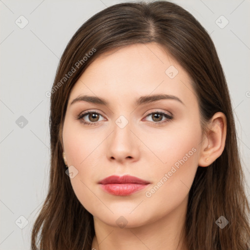 Neutral white young-adult female with long  brown hair and brown eyes