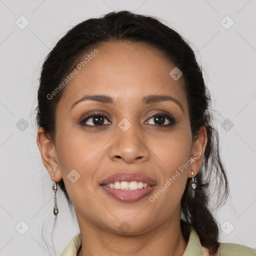 Joyful latino young-adult female with medium  brown hair and brown eyes