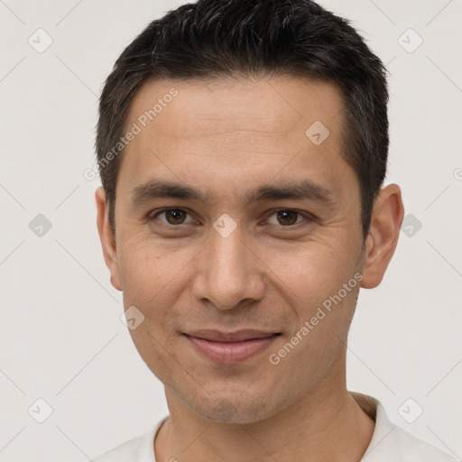 Joyful white adult male with short  brown hair and brown eyes