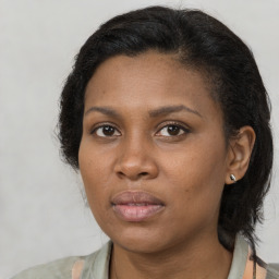 Neutral black young-adult female with short  brown hair and brown eyes