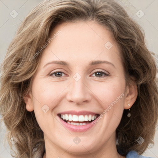 Joyful white young-adult female with medium  brown hair and green eyes