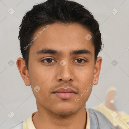 Neutral asian young-adult male with short  brown hair and brown eyes