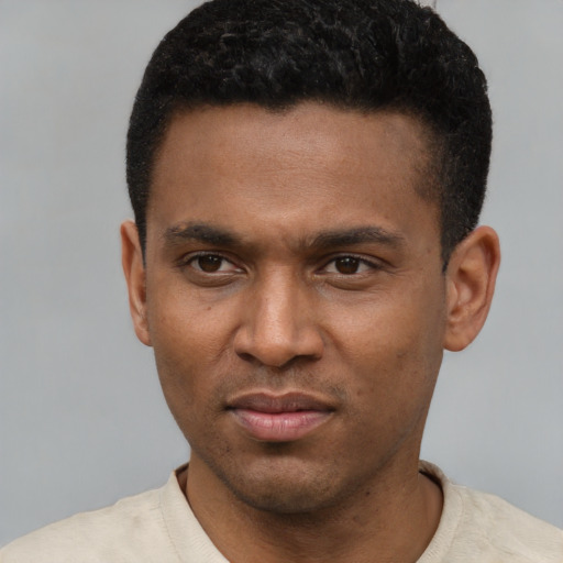 Neutral latino young-adult male with short  brown hair and brown eyes
