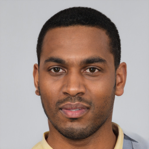Neutral black young-adult male with short  black hair and brown eyes