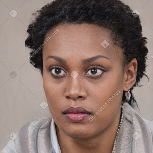 Neutral black young-adult female with short  brown hair and brown eyes