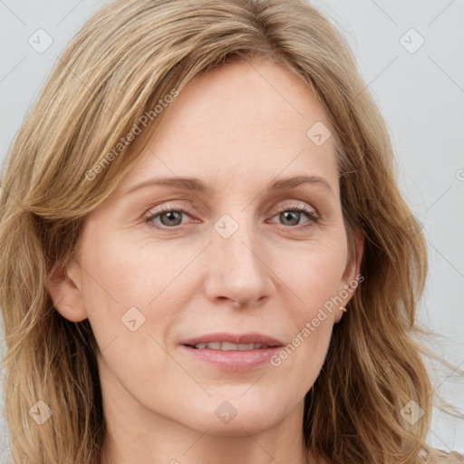 Joyful white young-adult female with long  brown hair and blue eyes