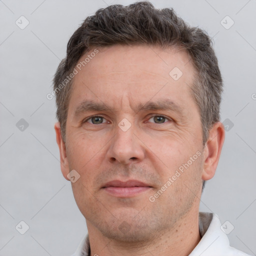 Neutral white adult male with short  brown hair and brown eyes