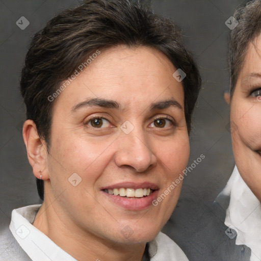 Joyful white adult female with short  brown hair and brown eyes