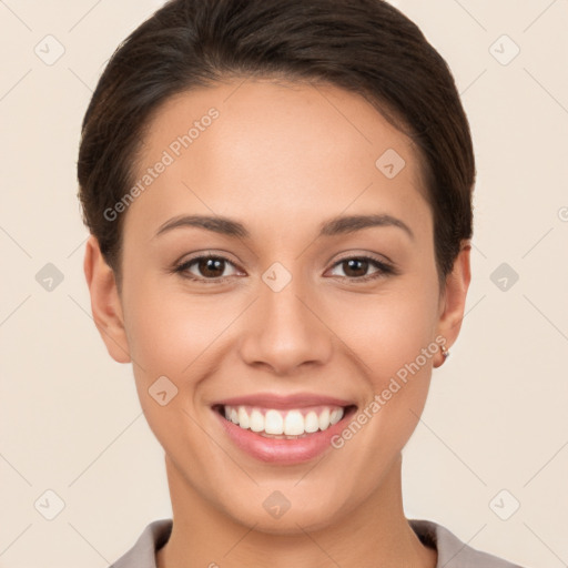 Joyful white young-adult female with short  brown hair and brown eyes