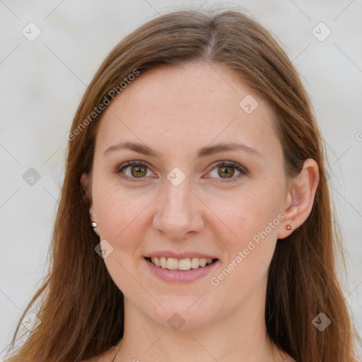 Joyful white young-adult female with long  brown hair and blue eyes