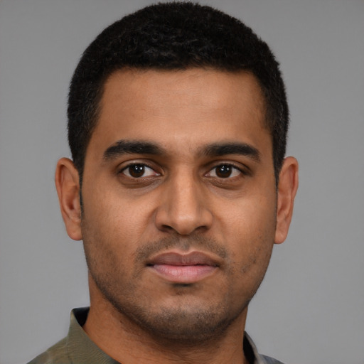 Neutral latino young-adult male with short  black hair and brown eyes
