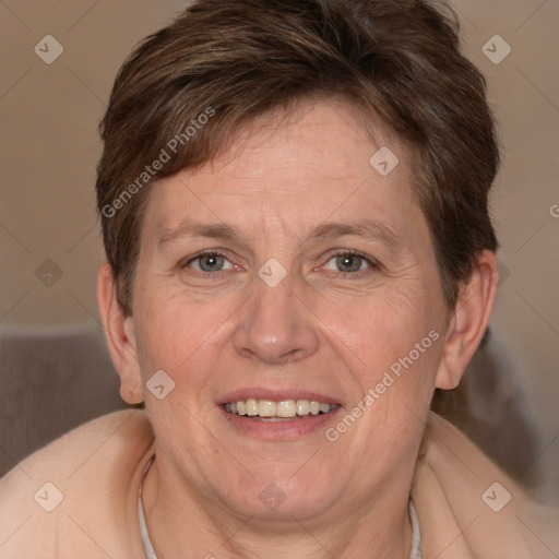 Joyful white adult female with short  brown hair and brown eyes