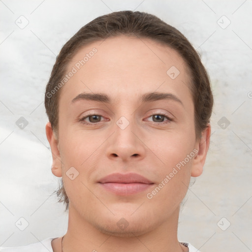 Joyful white young-adult female with short  brown hair and brown eyes