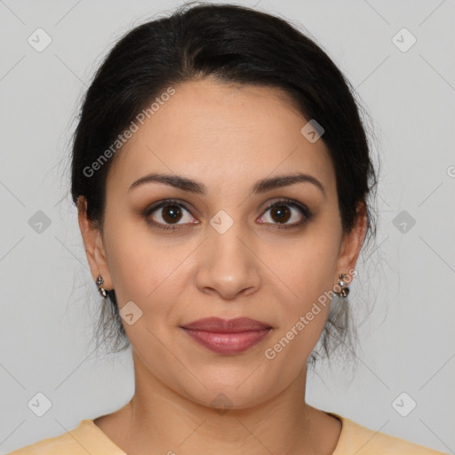 Joyful latino young-adult female with medium  brown hair and brown eyes