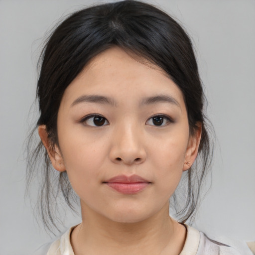Neutral asian young-adult female with medium  brown hair and brown eyes